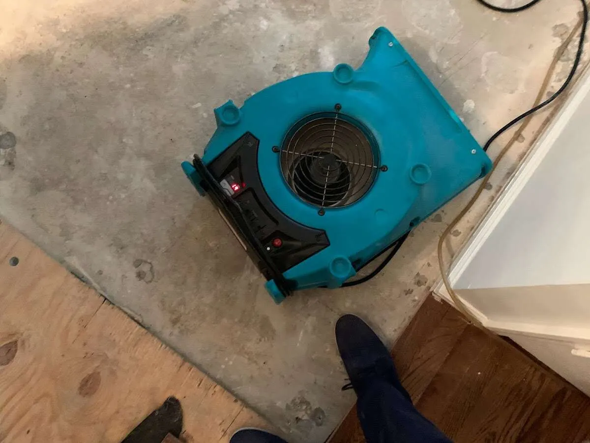 Air mover drying subfloor during Leak Detection & Repair in Fort Meade