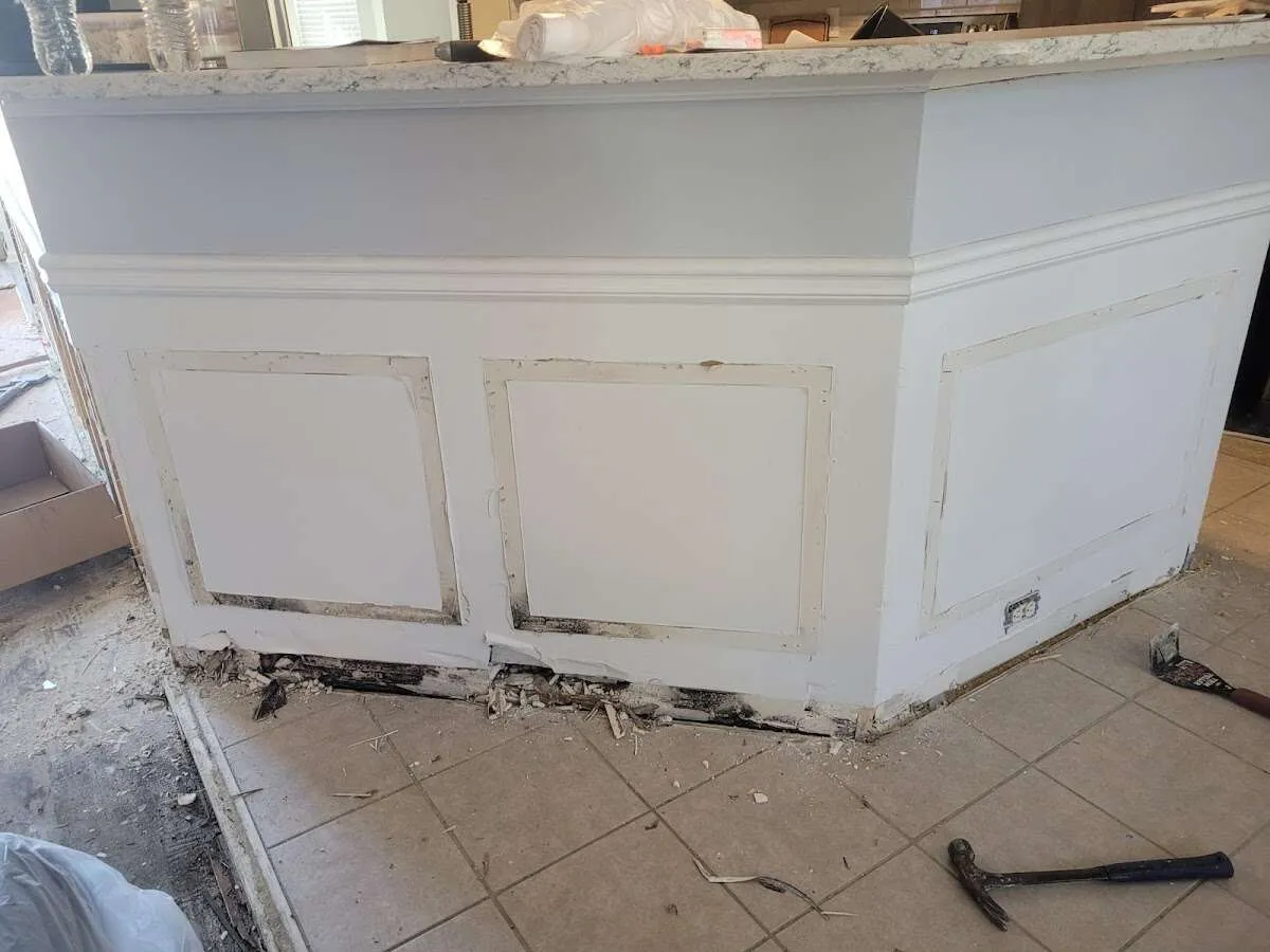Water damage and mold on kitchen during Storm Damage Restoration in Fort Meade